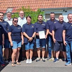 Man sieht die Feuerwehr von Harpertshausen.